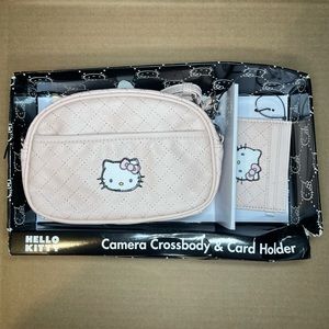 Pink hello kitty cross body bag with card holder still in box